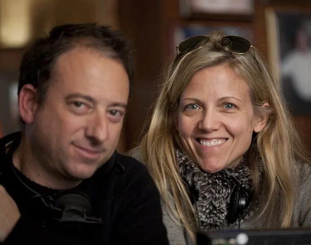 Two people smiling together
